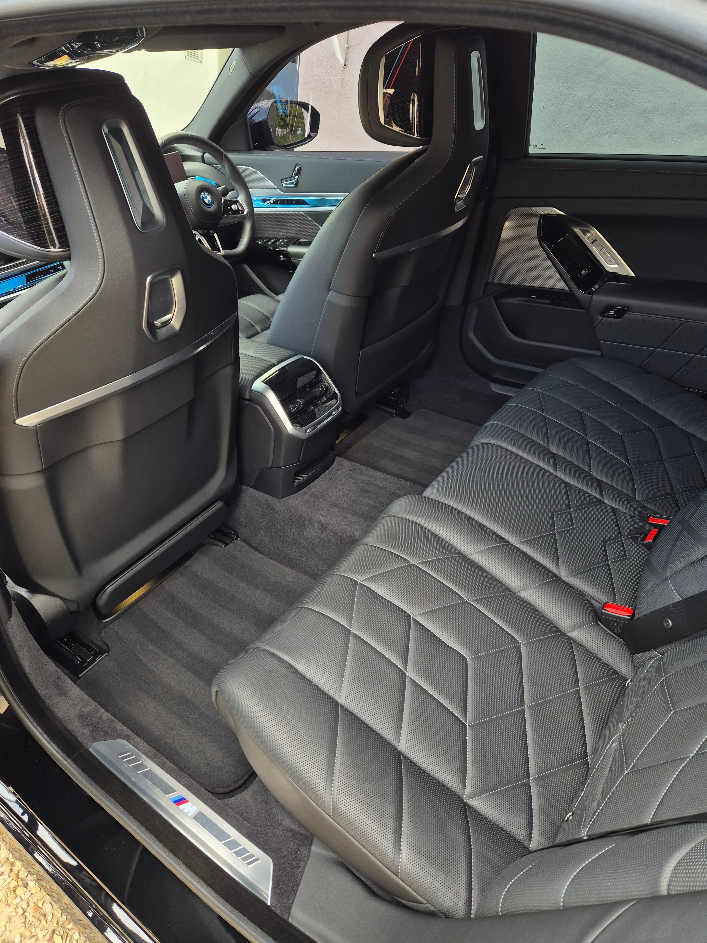 BMW M rear seats — diamond-stitched leather after conditioning
